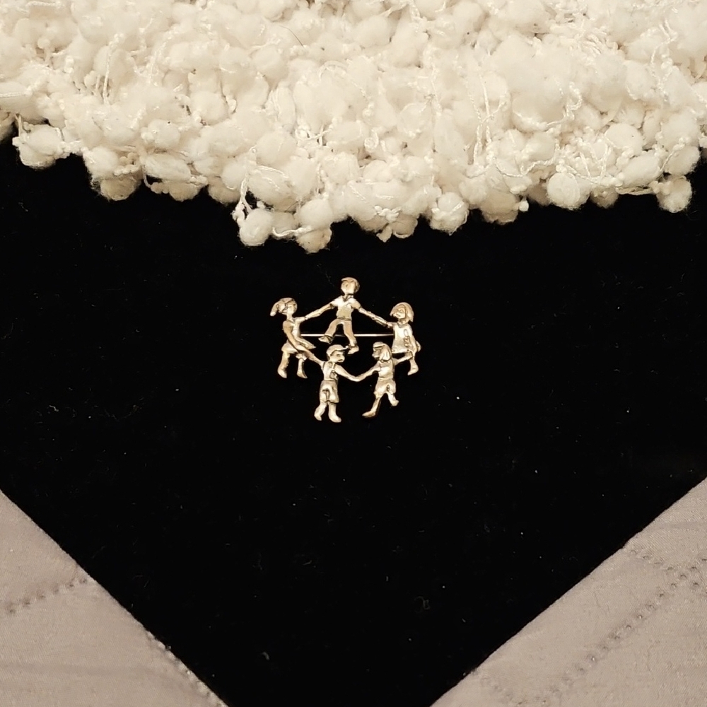 Silver Brooch with Dancing Figures